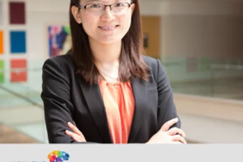 Headshot of Hengchen Dai with a caption including the How the World Works Podcast logo and her name.